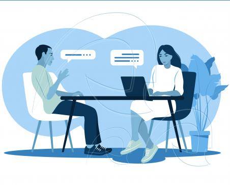 Persona teniendo una entrevista de trabajo con otra.